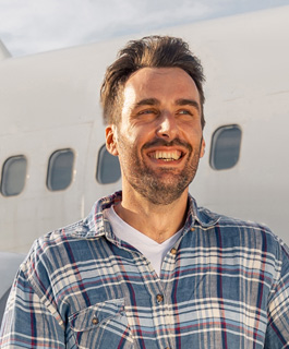 Traveller smiling while settling into a new EU country